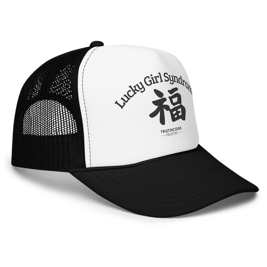 Black and white trucker hat with 'Lucky Girl Syndrome' text and Chinese symbol, on a white background