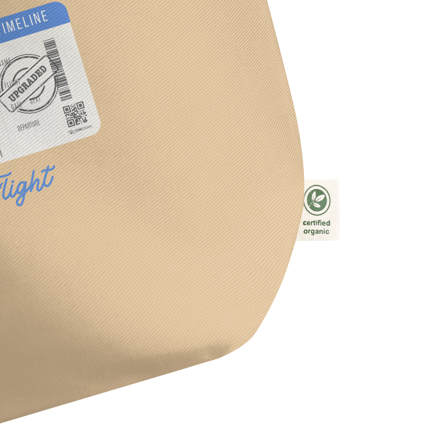 Beige organic tote zoomed in on green and white tag with text 'Certified organic'