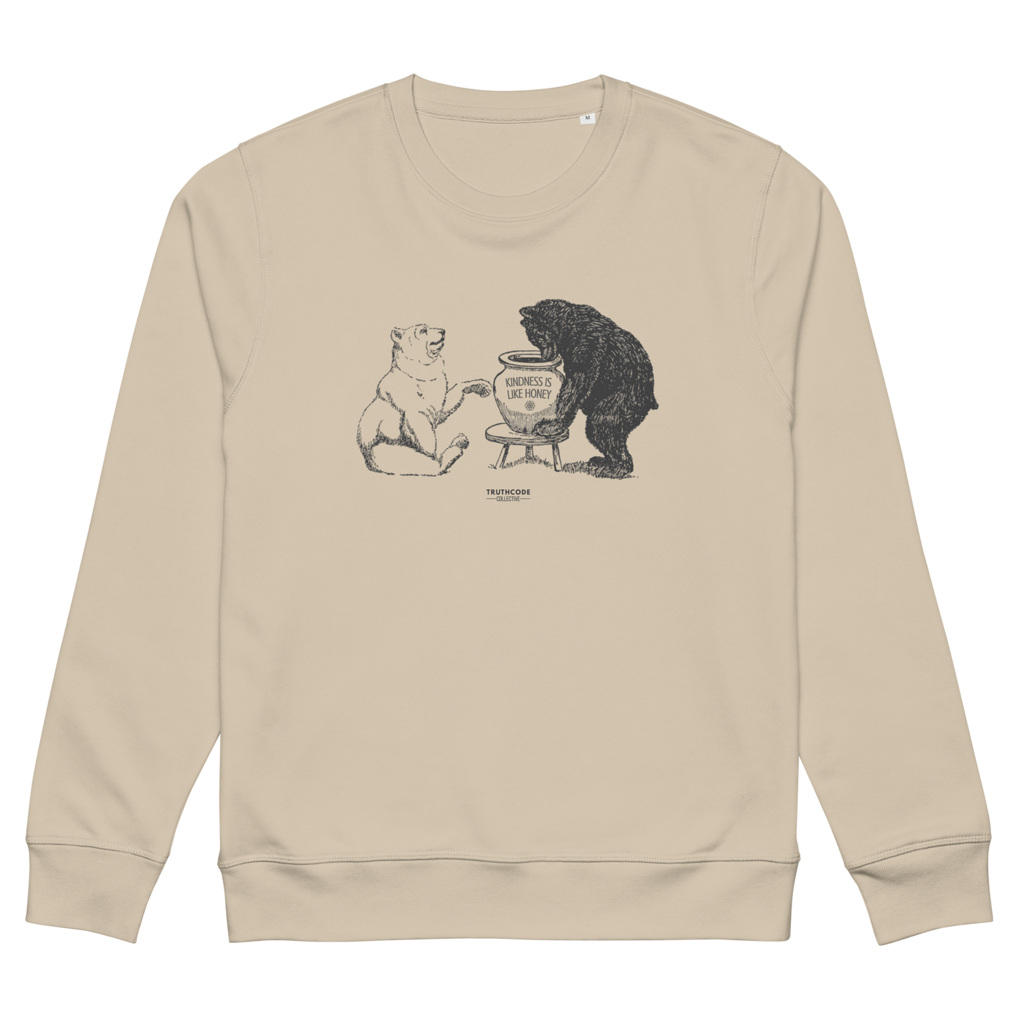 Beige organic sweatshirt with a graphic of two bears and a honey pot and text 'Kindness is like honey' on a white background