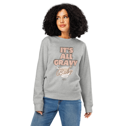Woman wearing gray organic sweatshirt with 'It's All Gravy Baby' text and graphic design of a gravy boat on a white background