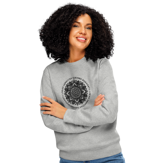 Woman wearing gray organic sweatshirt with black mandala and mantra design on a white background