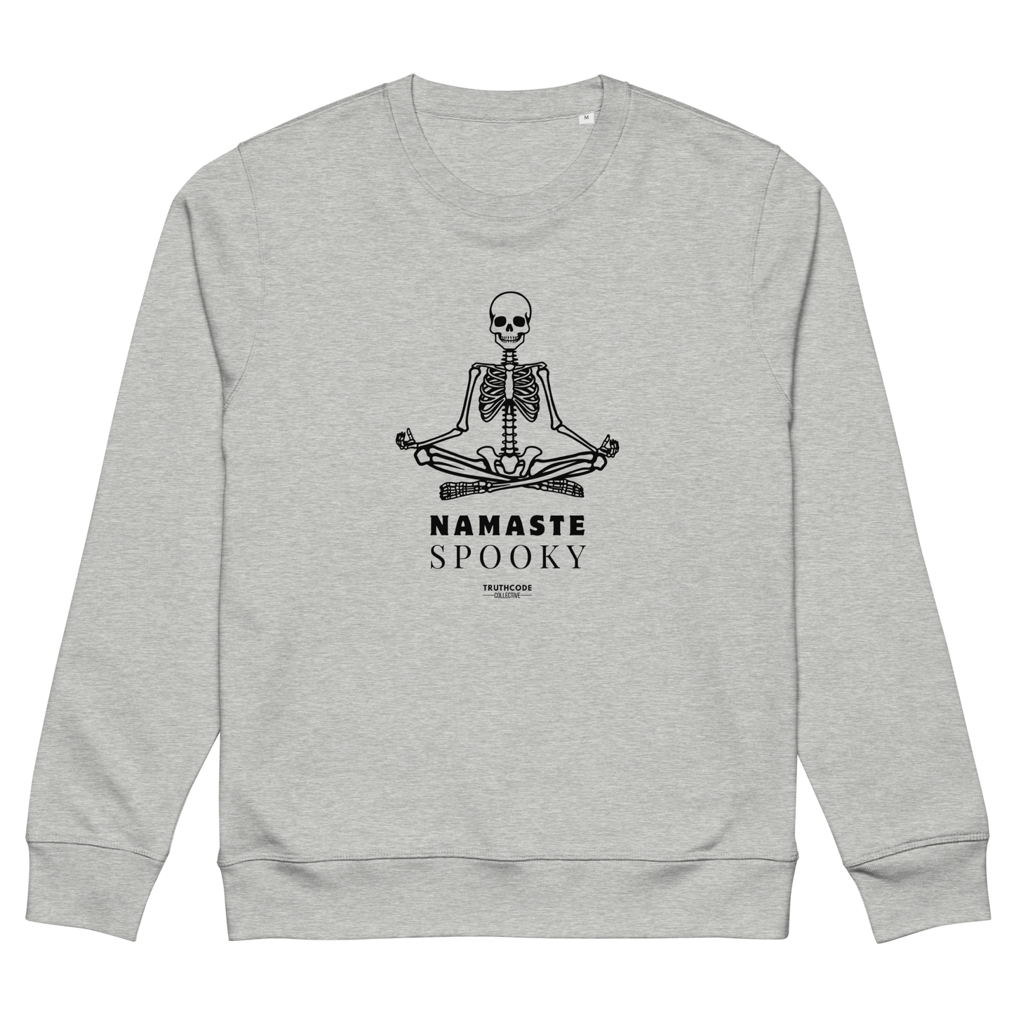Gray organic sweatshirt with a skeleton design and 'Namaste Spooky' text on a white background