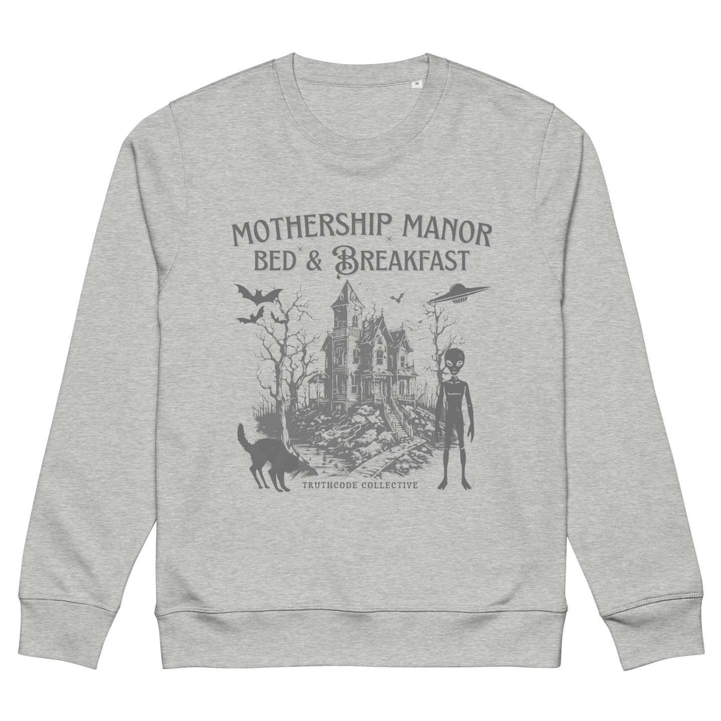 Gray organic sweatshirt with a graphic design of a haunted house, alien, and spaceship, with text 'Mothership Manor Bed & Breakfast' on a white background