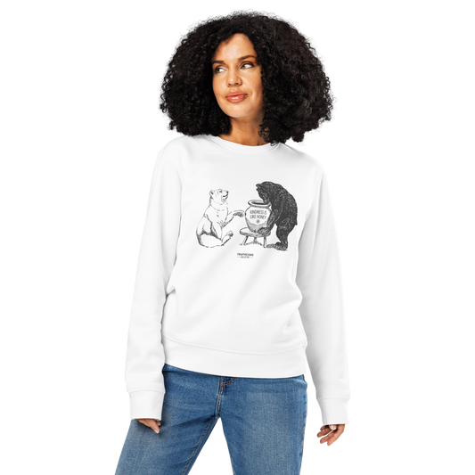 Woman wearing white organic sweatshirt with bears eating honey graphic and text 'Kindness is like honey' on a white background
