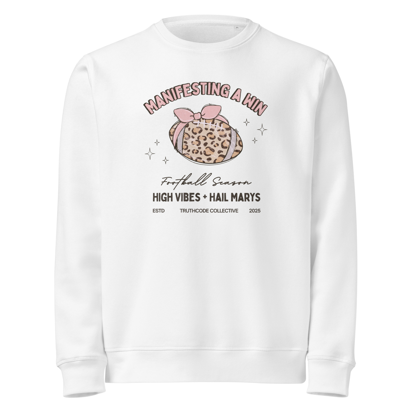 White organic sweatshirt with girly football graphic design and text 'Manifesting a win, high vibes + hail marys' on a white background
