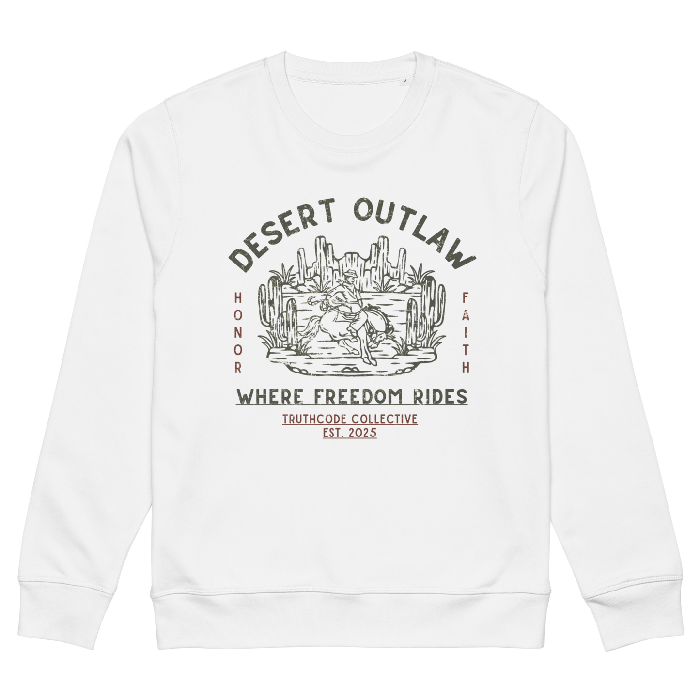 White organic sweatshirt with text 'Desert Outlaw, where freedom rides' and scene of cowboy on a bronco in desert graphic design, on a white background