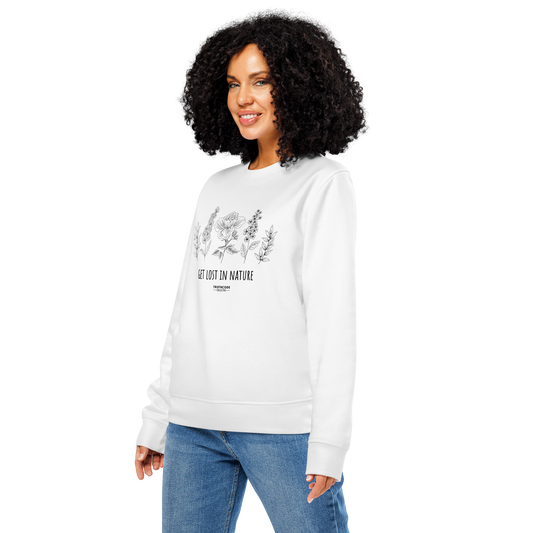 Woman wearing white organic sweatshirt with floral stems design and text reading 'Get lost in nature' on a white background