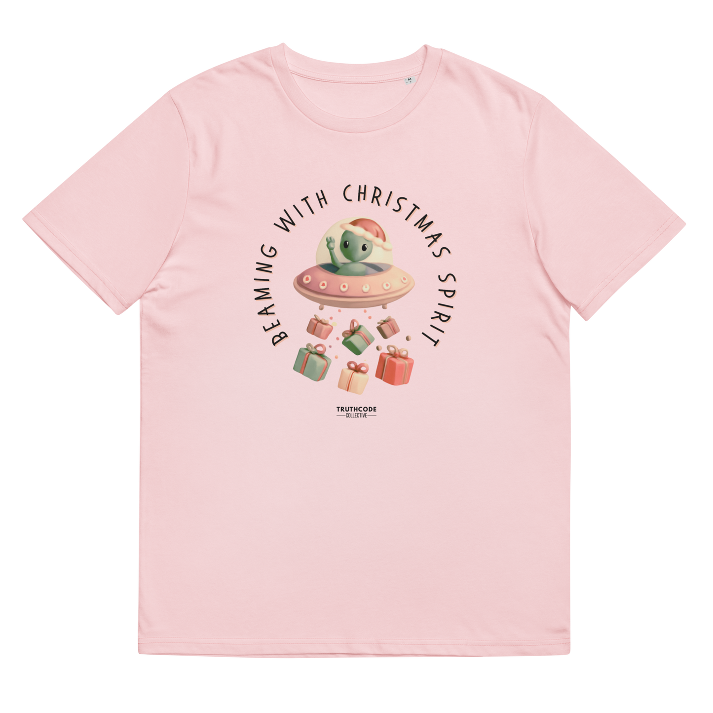 Pink organic t-shirt with cute alien in a spaceship Christmas-themed graphic and text 'Beaming with Christmas spirit'
