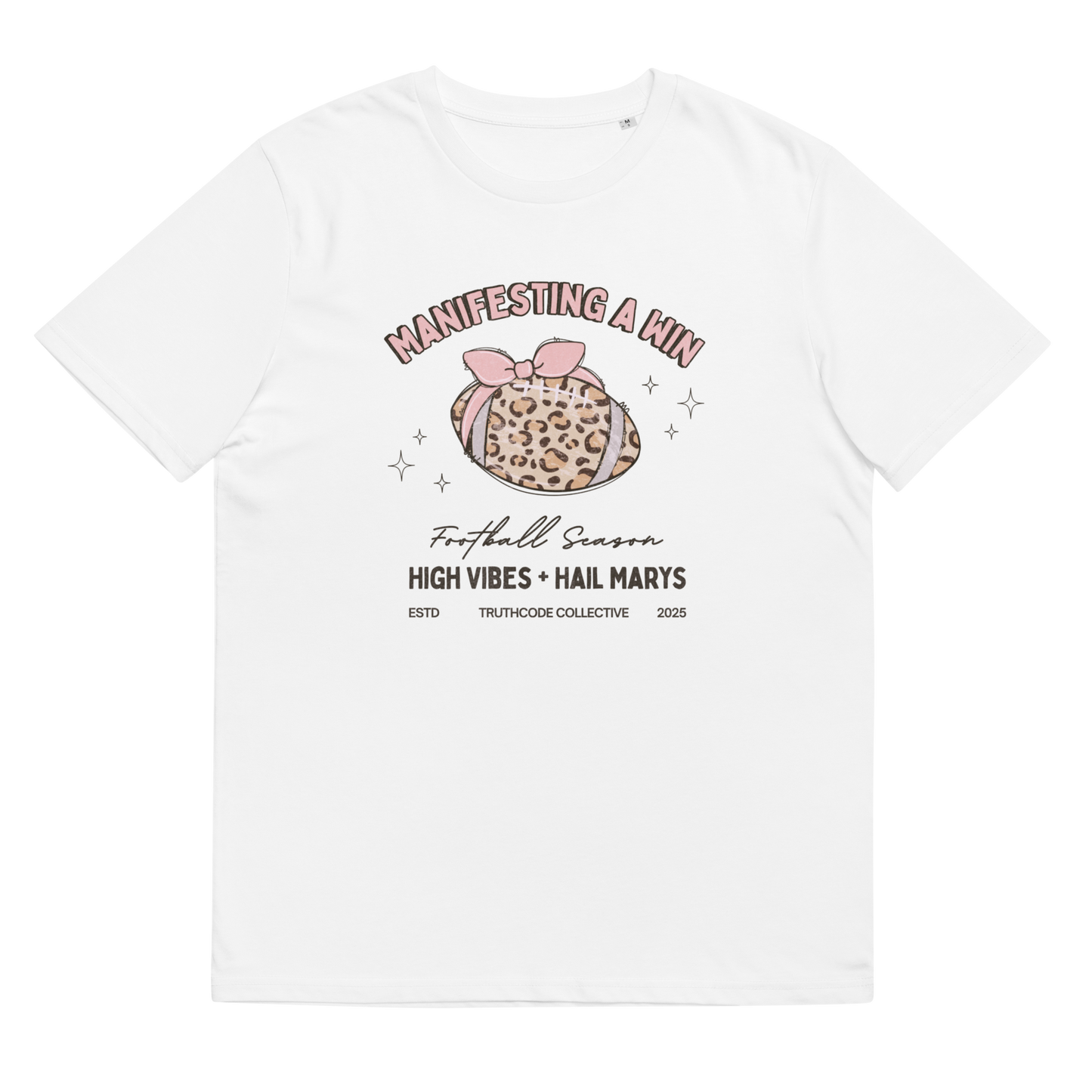 White organic t-shirt with girly football graphic design and text 'Manifesting a win, high vibes and hail marys' on a white background