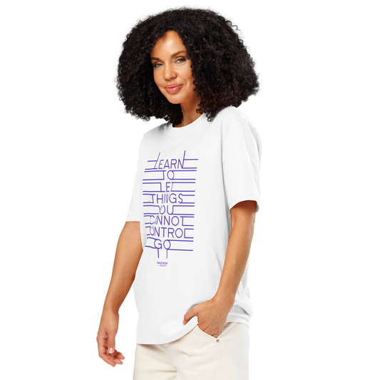 Woman wearing white organic t-shirt with purple motivational quote 'Learn to let things you cannot control go' on a white background