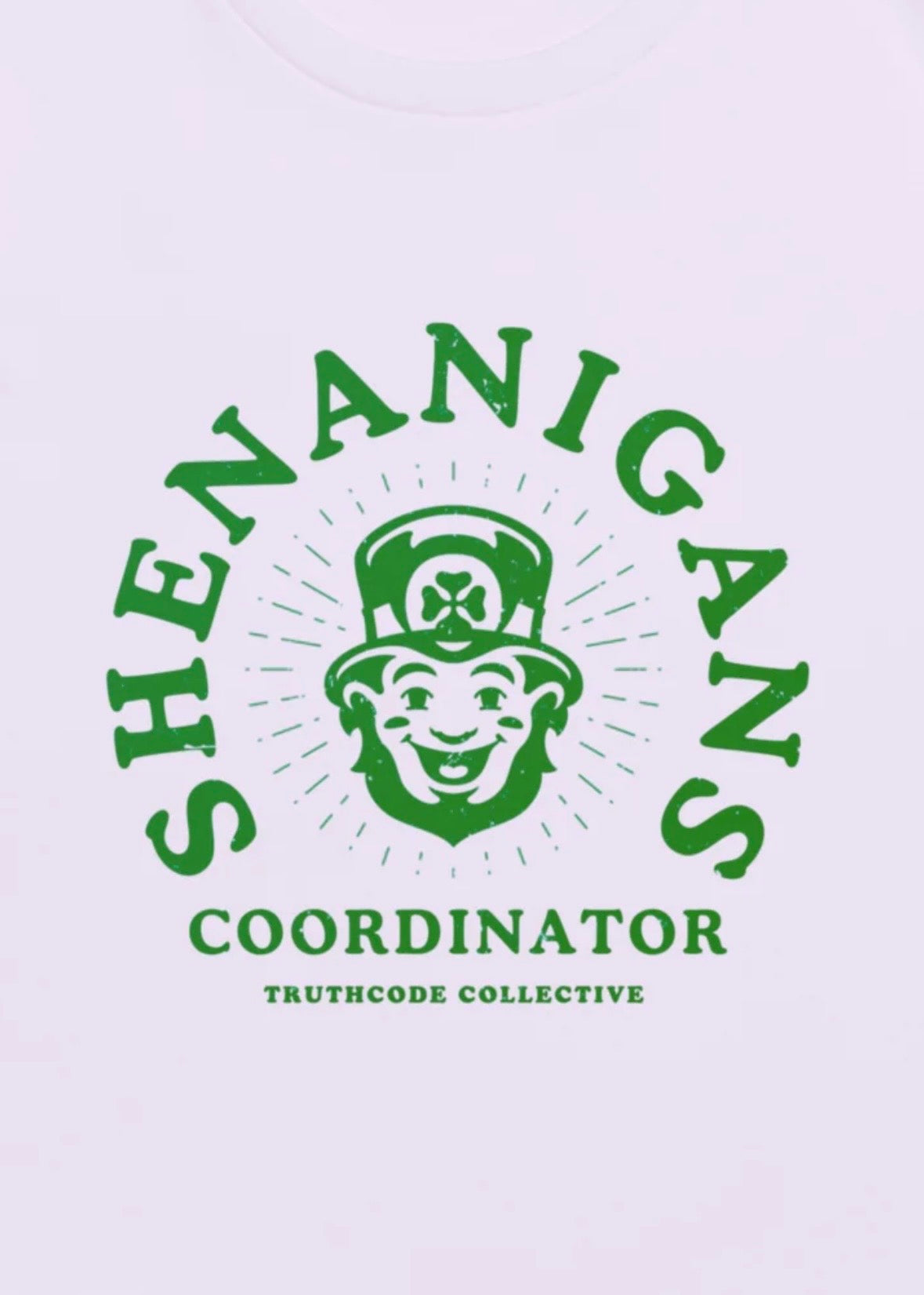 Logo with a smiling face wearing a top hat and the text 'Shenanigans Coordinator' on a light purple background.