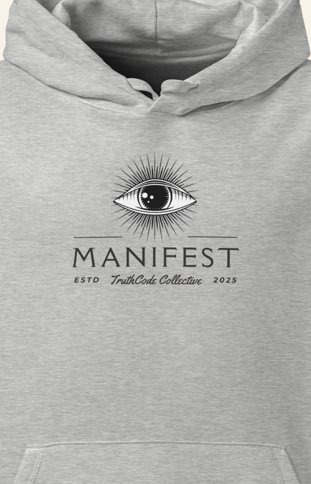 Gray organic hoodie with  image of all seeing eye and black text 'Manifest'  on a plain background