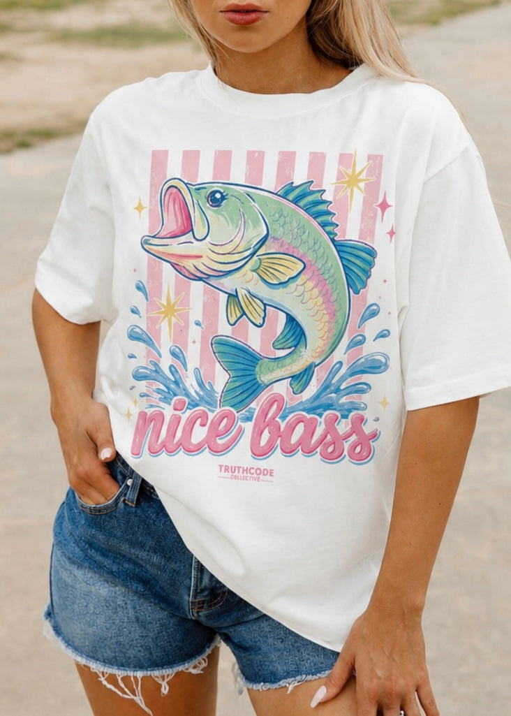 Person wearing a white t-shirt with a colorful bass graphic and 'nice bass' text.