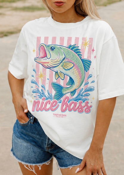 Person wearing a white t-shirt with a colorful bass graphic and 'nice bass' text.