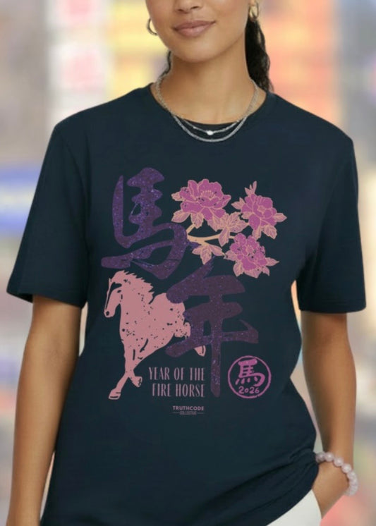 Person wearing a black t-shirt with a graphic design of a horse and floral elements representing YEAR OF THE FIRE HORSE 2026 as stated in text.