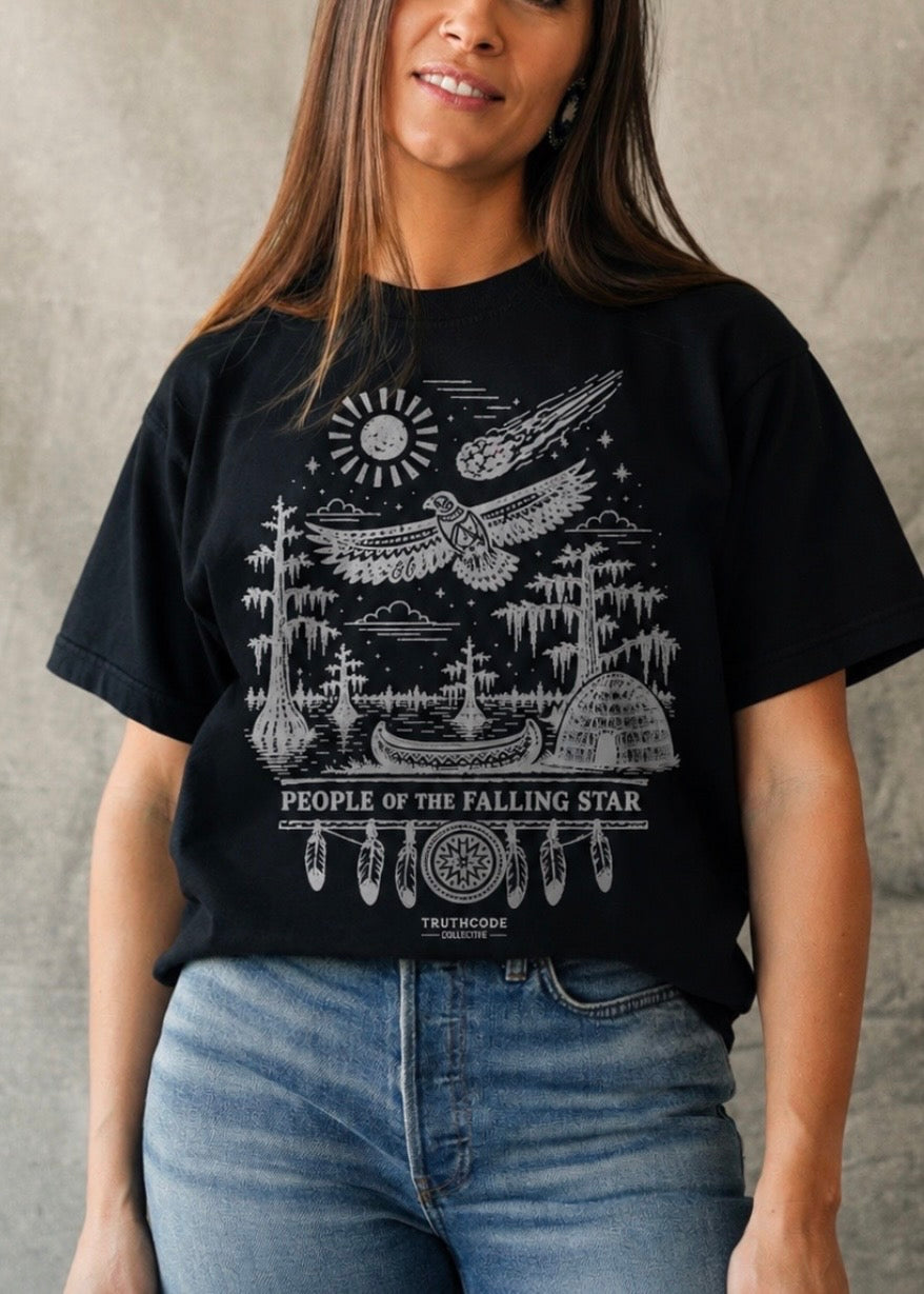 Person wearing a black t-shirt with a graphic design and text, standing against a neutral background. Text says 'People of the Falling Star'.