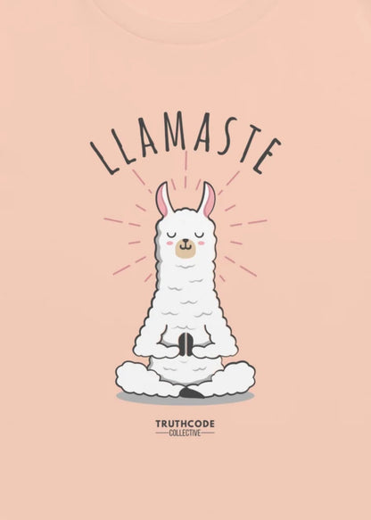 Close view of a peach t-shirt with a graphic design of a meditating llama with 'LLAMASTE' text 