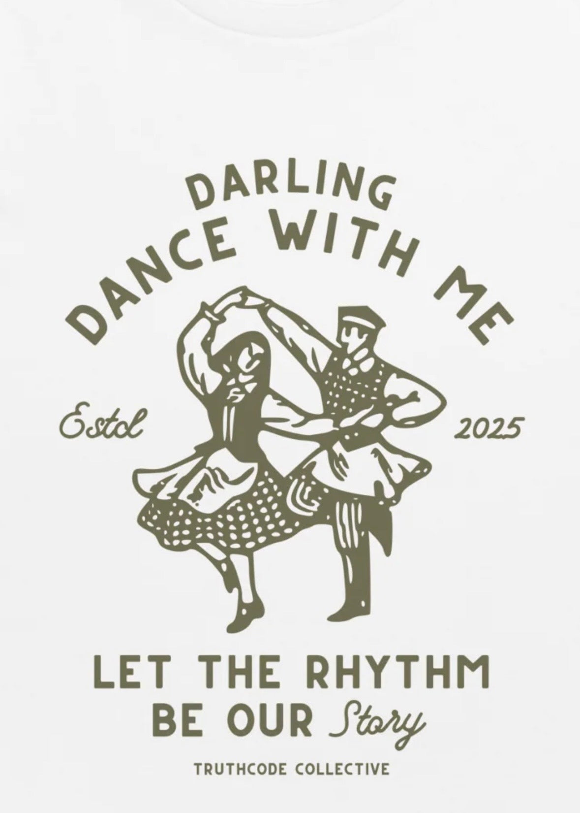 Close view of white t-shirt with vintage-style dance illustration with text 'Darling Dance With Me' and 'Let the Rhythm Be Our Story' 