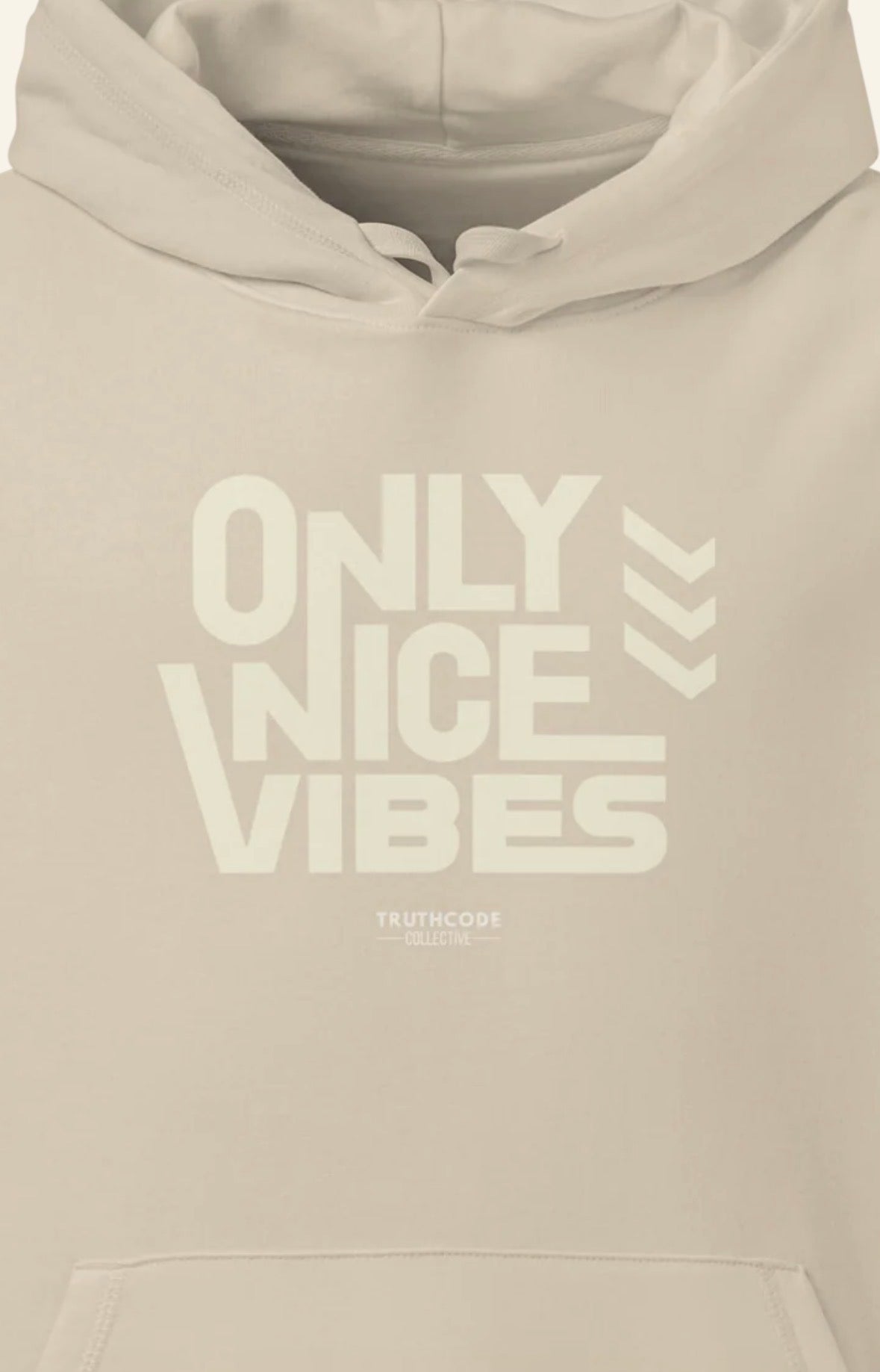 Beige hoodie with 'Only Nice Vibes' cream text on a beige background