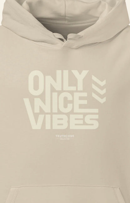 Beige hoodie with 'Only Nice Vibes' cream text on a beige background