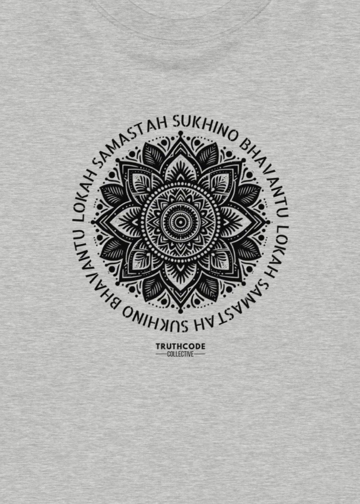 Close view of gray t-shirt with a black mandala design and text around the mandala