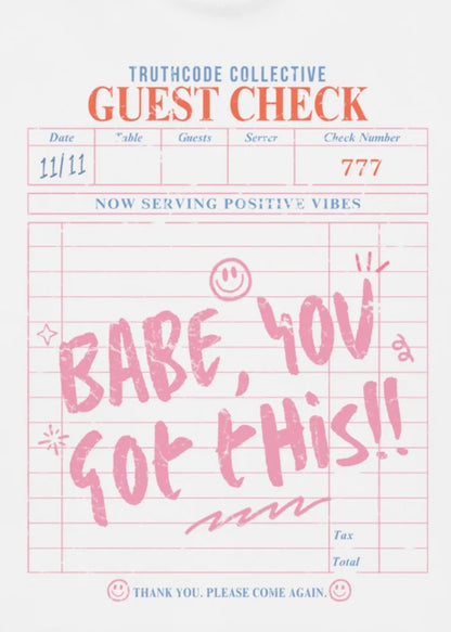 Close view of white t-shirt with a guest check style graphic design and text 'Babe, you got this!' written on the guest check.