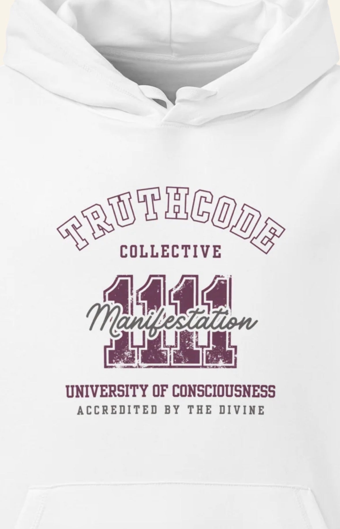 White organic hoodie with 'Truthcode Collective, 1111 Manifestation, university of consciousness, accredited by the divine' text and design on a white background