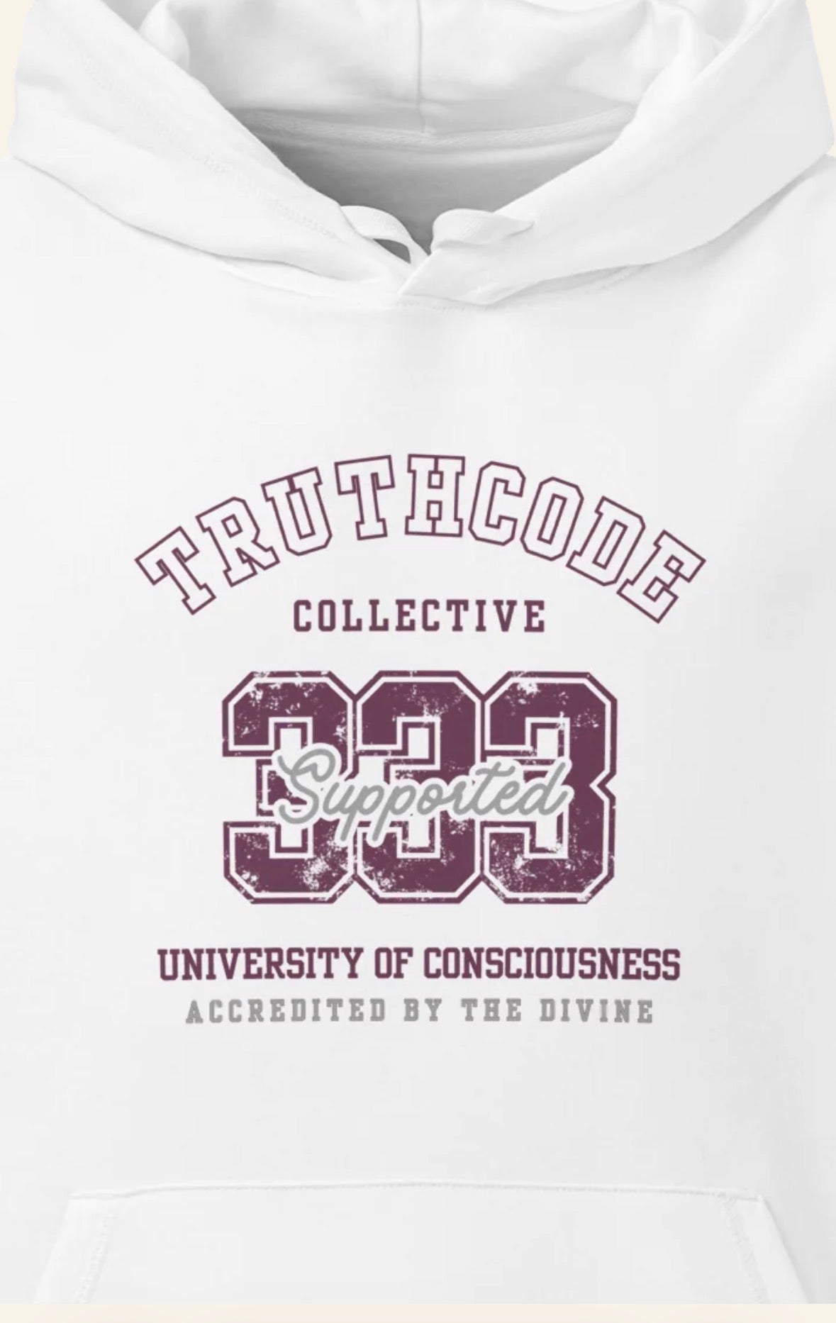 White organic hoodie with 'Truthcode Collective, 333 Supported, university of consciousness, accredited by the divine' text on a white background