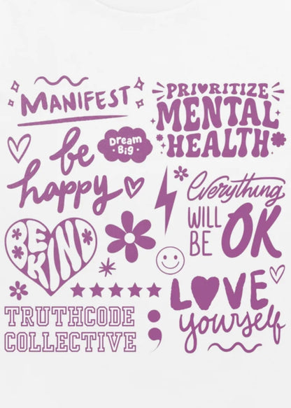 Close view of a white t-shirt with motivational phrases of positivity and mental health