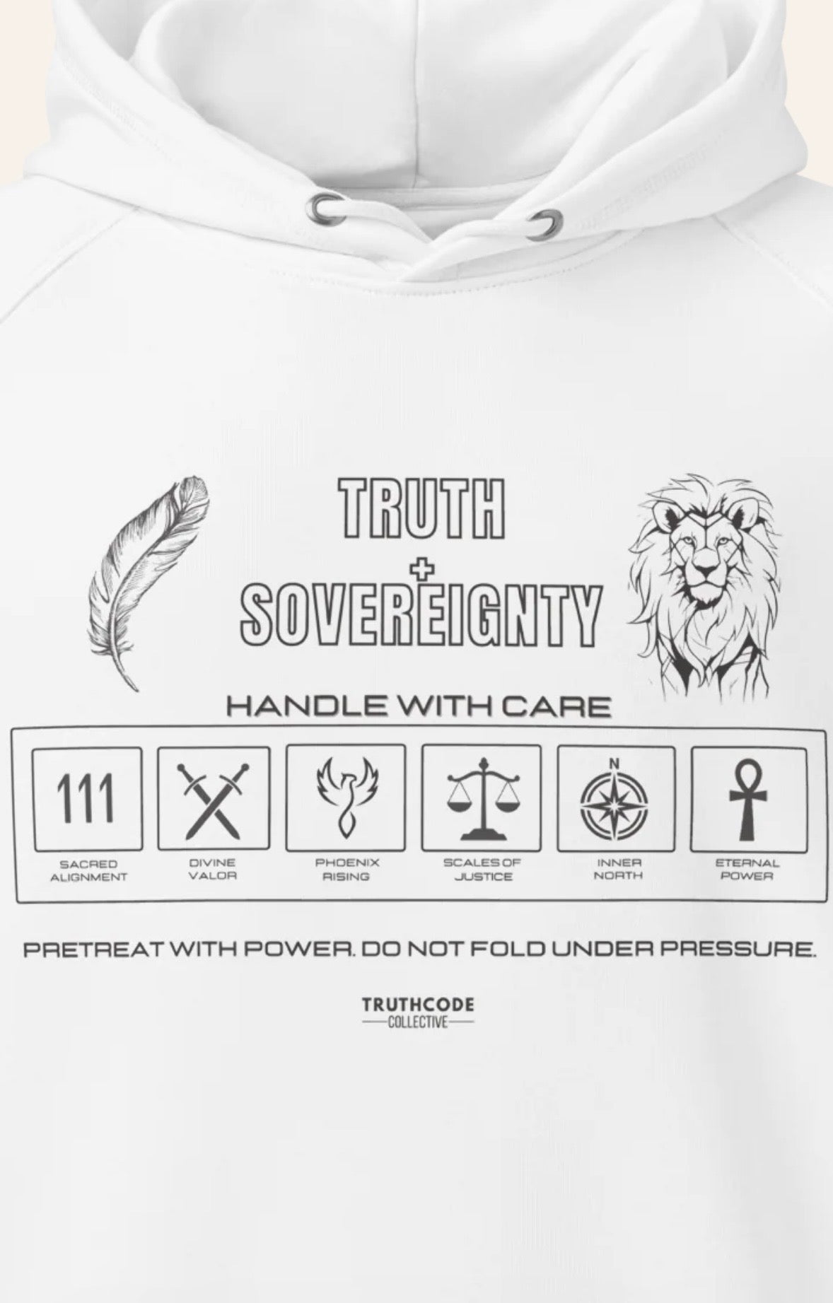 Close view of white hoodie with laundry tag style graphics and text 'Truth + Sovereignty' on a white background