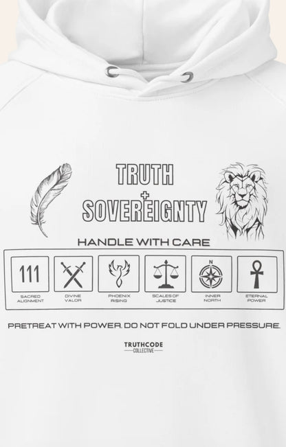 Close view of white hoodie with laundry tag style graphics and text 'Truth + Sovereignty' on a white background