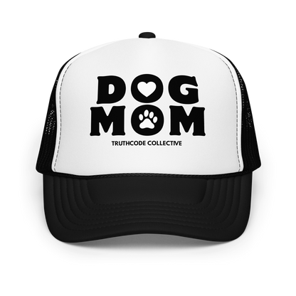 Black and white trucker hat with 'DOG MOM' text and paw print on a white background