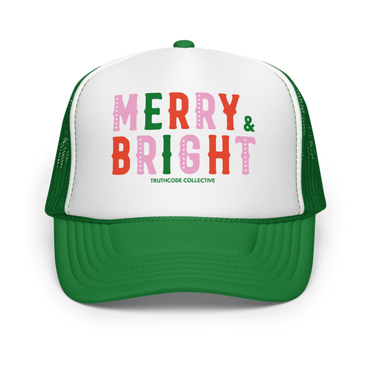 Green and white trucker hat with 'Merry & Bright' text on a white background