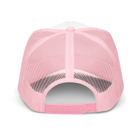 The back of a pink mesh cap showing adjustable snaps 
