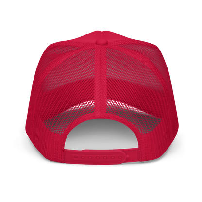 Back of red trucker hat showing mesh cap and adjustable snaps