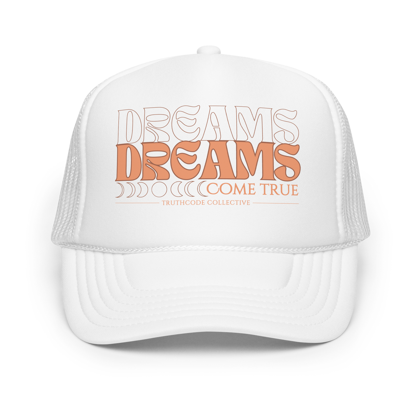White trucker cap with 'Dreams Come True' text on a white background