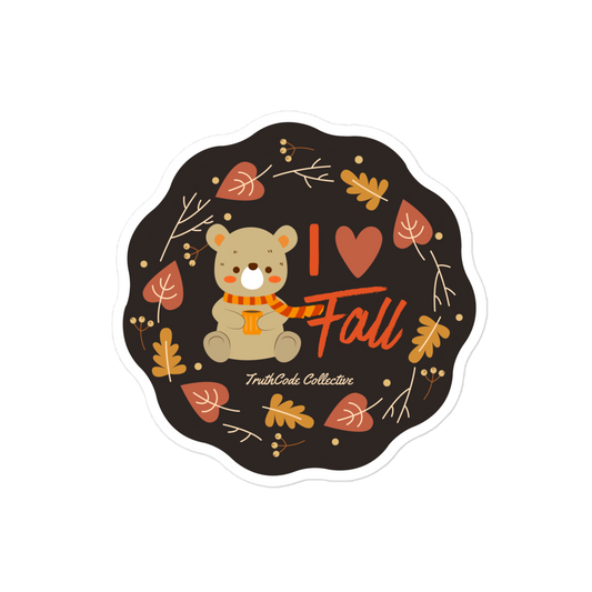 Sticker with a bear wearing an orange scarf and 'I love fall' text on a black background.