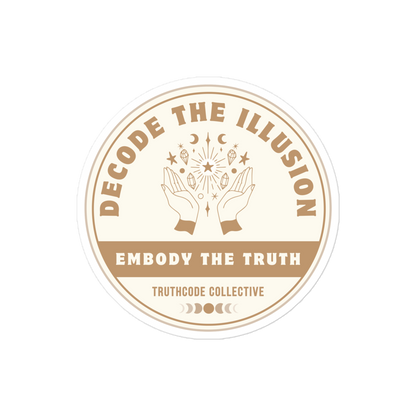 Circular sticker with text 'Decode the Illusion, Embody the Truth' and graphic design of hands and magical symbols and crystals above them, on a white background. 