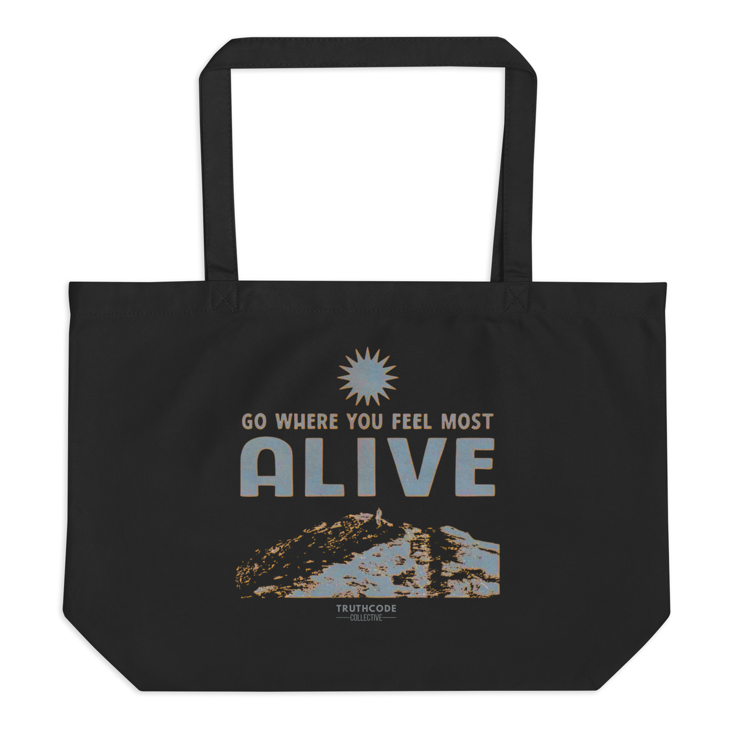Black organic tote bag with motivational quote 'Go where you feel most alive' and sun graphic on a white background