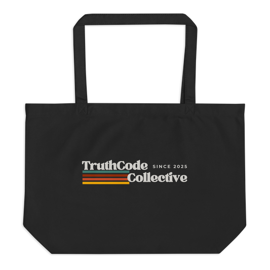 Black organic tote bag with retro 'TruthCode Collective' logo on a white background
