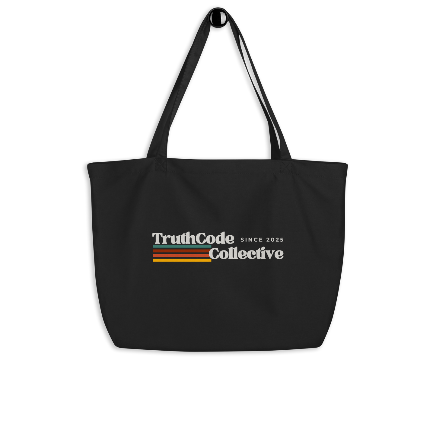 Black organic tote bag with retro 'TruthCode Collective' logo on a white background