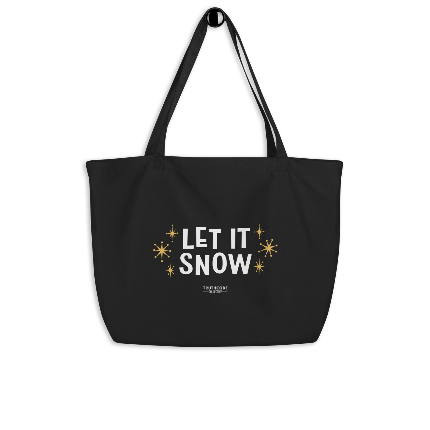 Black organic tote bag with 'Let It Snow' text and star designs on a white background