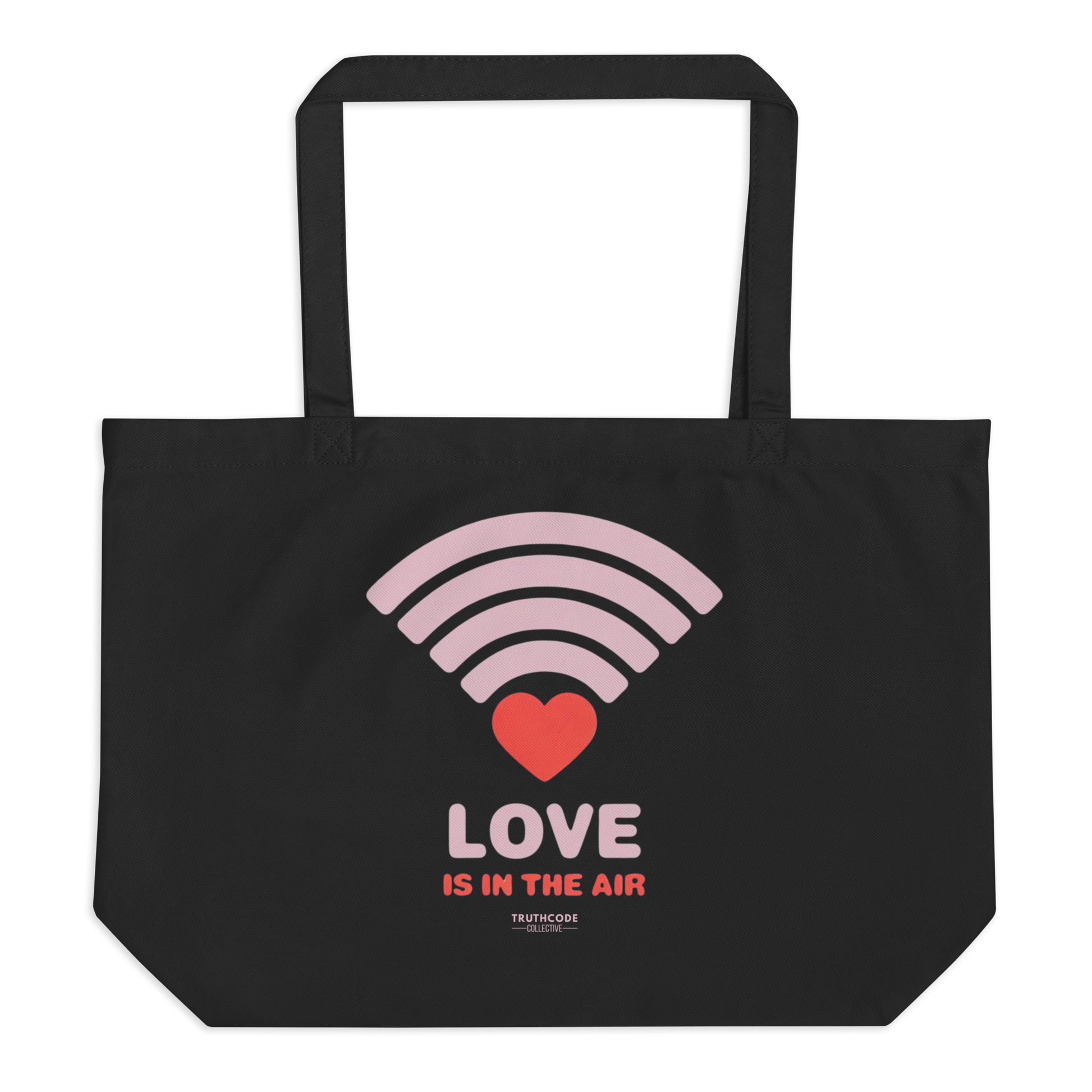 Black organic tote bag with pink heart wifi graphic design and text 'LOVE IS IN THE AIR' on a white background