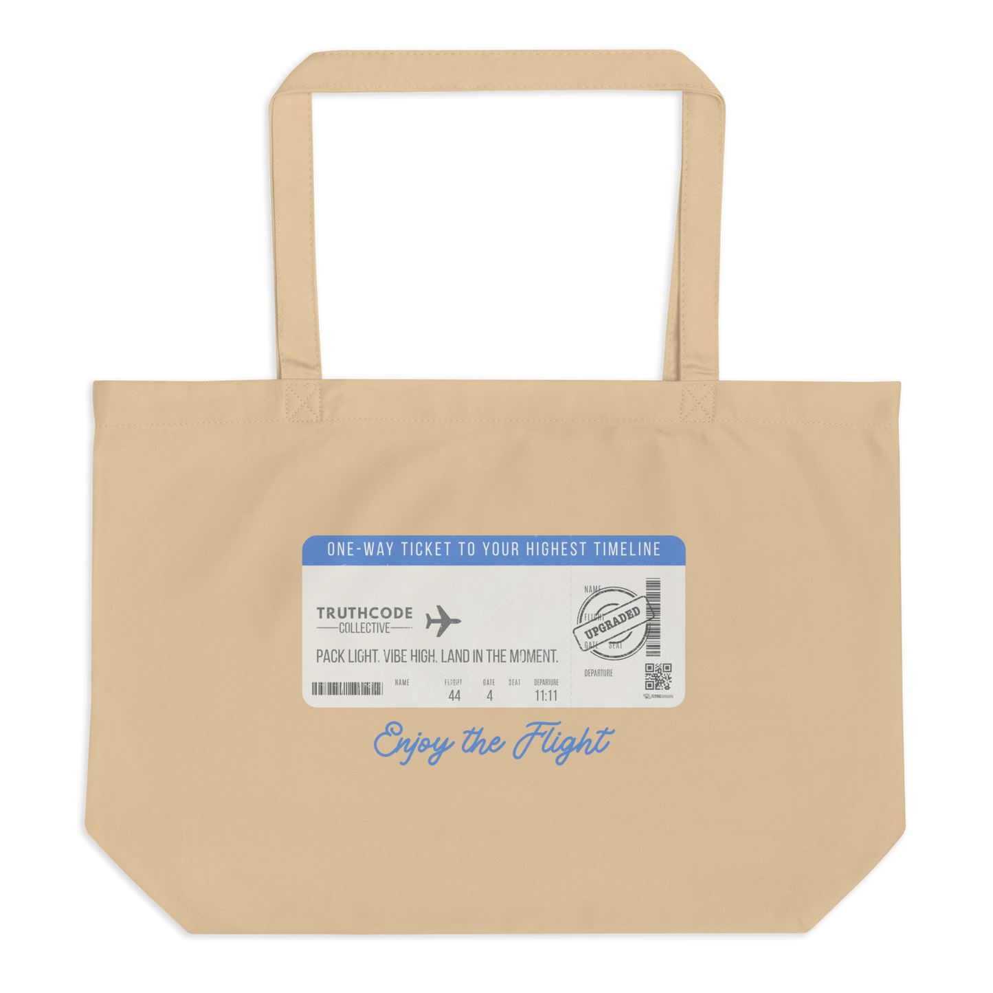 Beige organic tote bag with airline ticket graphic and text reading 'Enjoy the flight' on a white background
