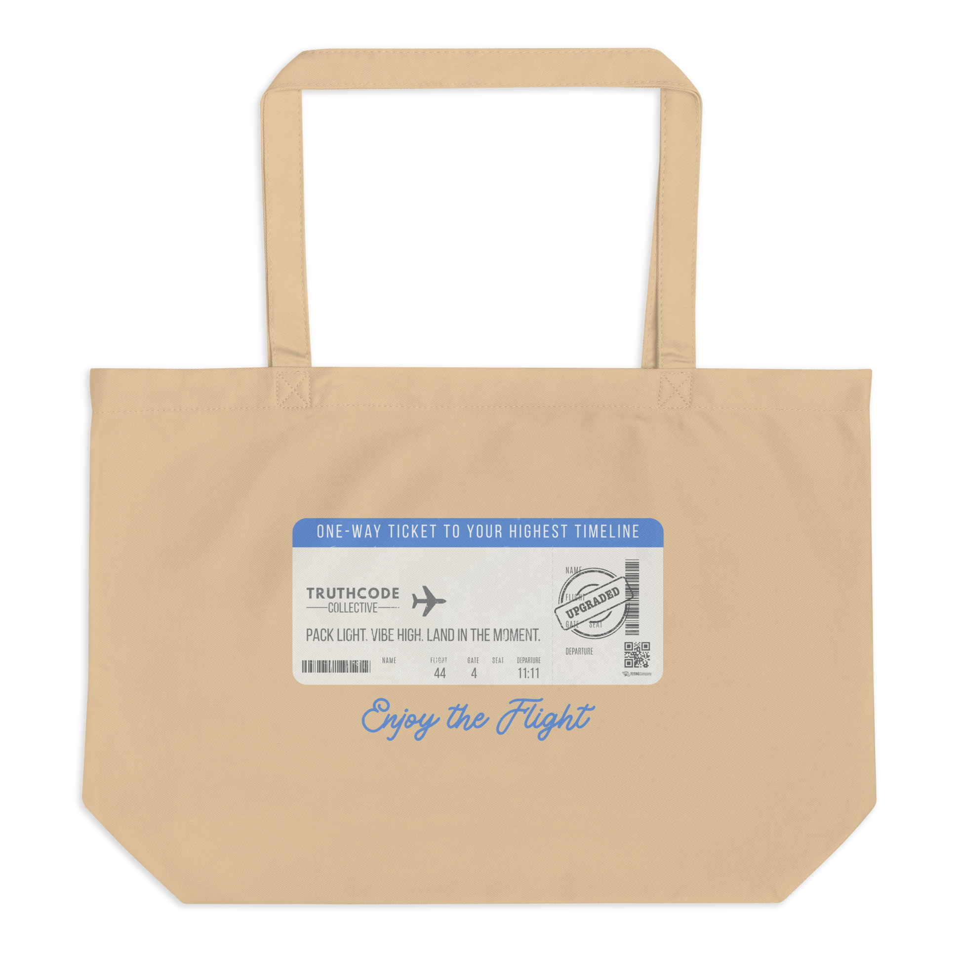 Beige organic tote bag with airline ticket graphic and text reading 'Enjoy the flight' on a white background