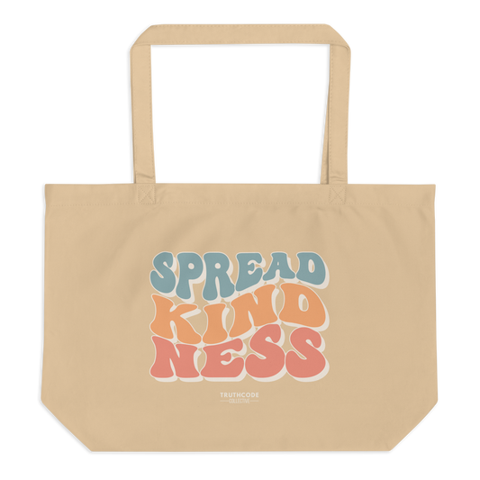 Beige organic tote bag with 'Spread Kindness' text in colorful letters on a white background