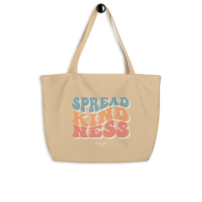 Beige organic tote bag with 'Spread Kindness' text on a white background