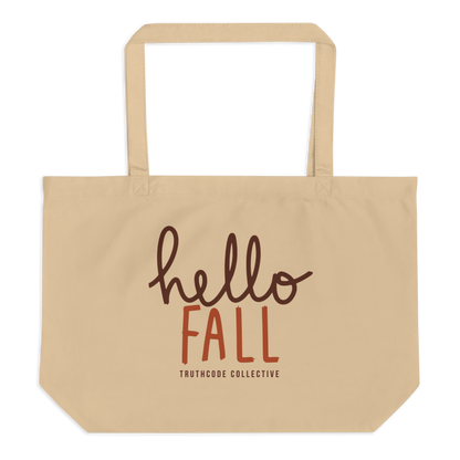 Beige organic tote bag with 'hello FALL' text and Truthcode Collective logo on a white background