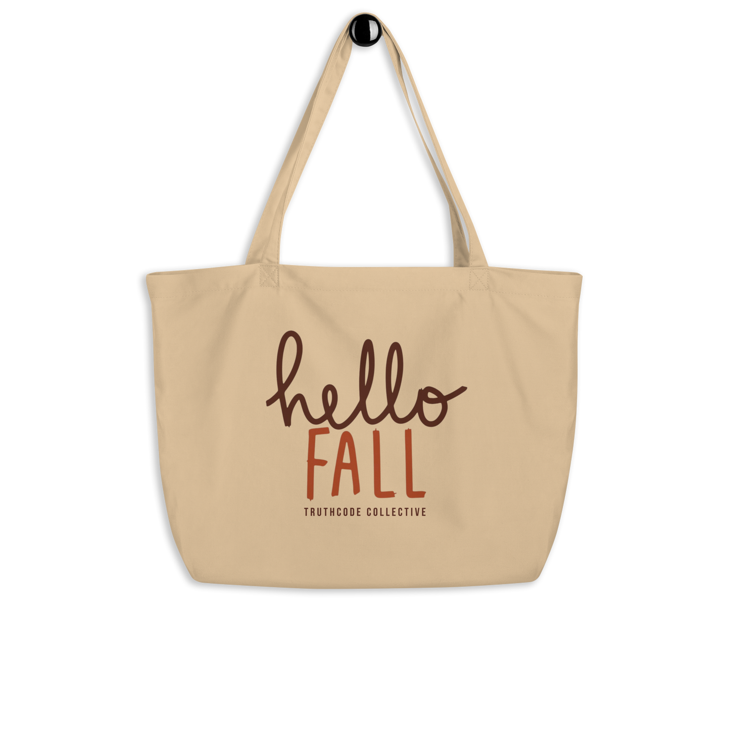 Beige organic tote bag with 'hello FALL' text and Truthcode Collective logo on a white background