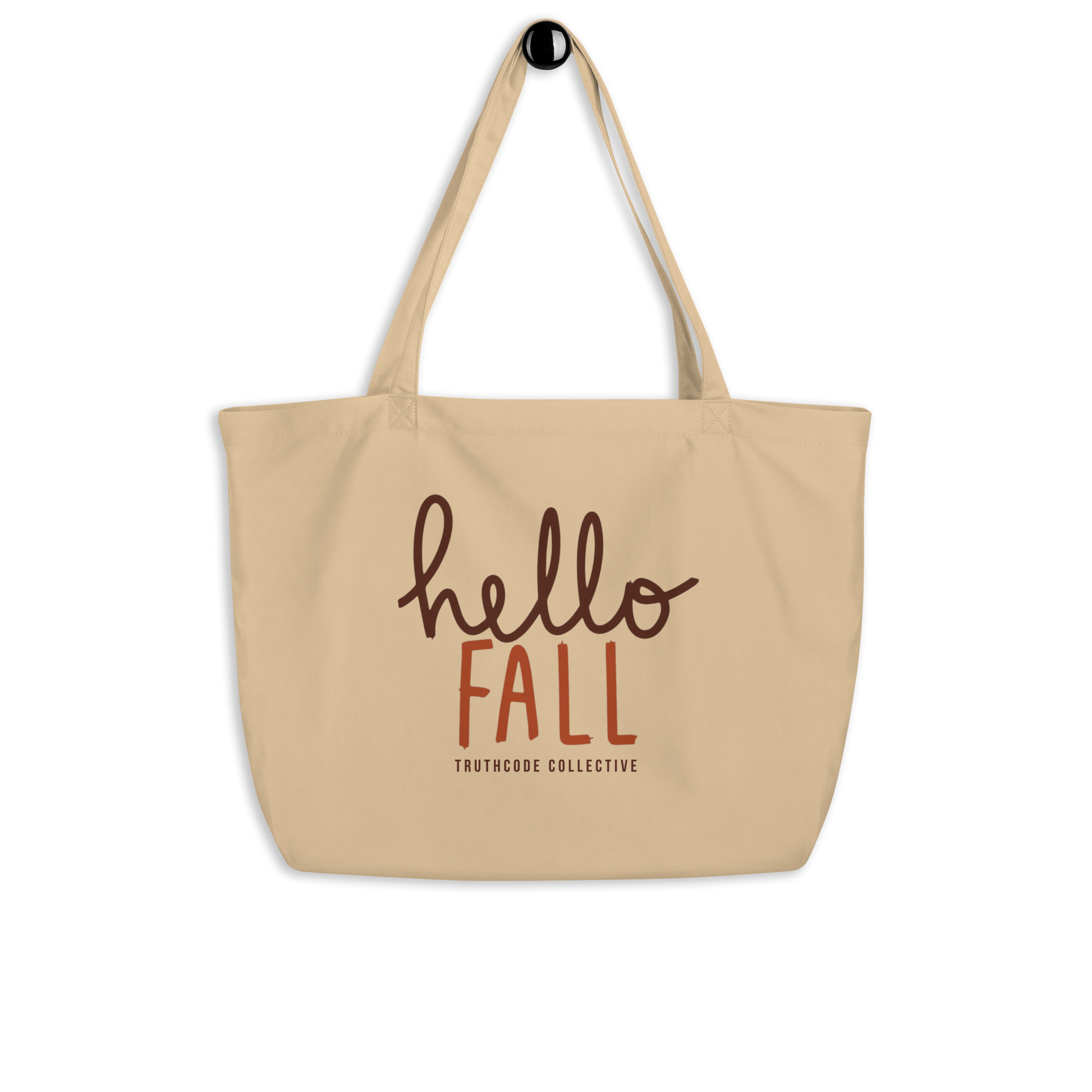 Beige organic tote bag with 'hello FALL' text and Truthcode Collective logo on a white background